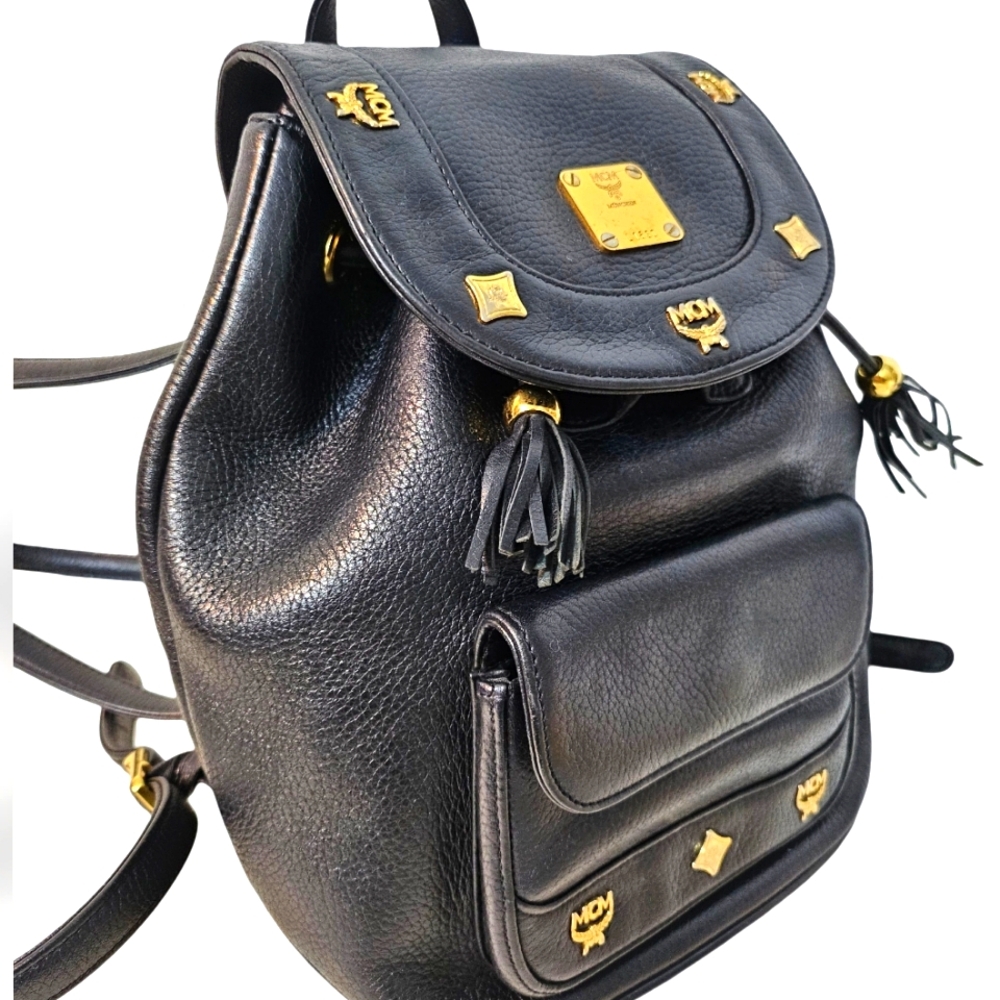 MCM Black and Gold Backpack with Luxurious Leather Finish